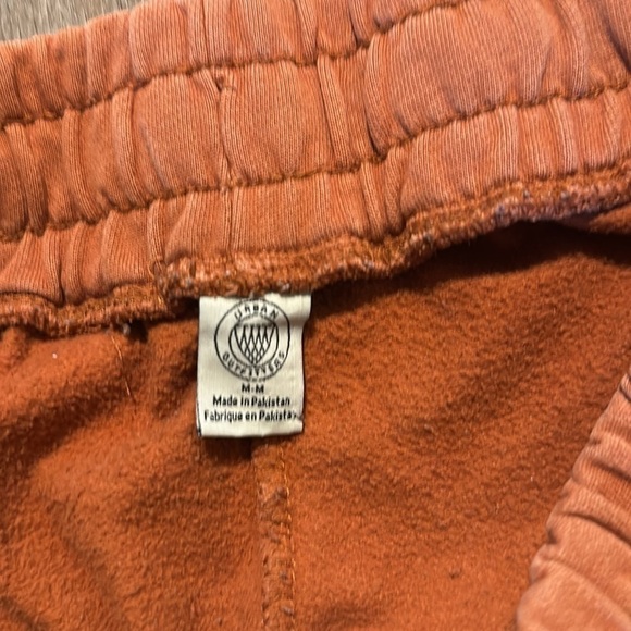URBAN OUTFITTERS RUST ORANGE RAW HEM CROPPED SWEATPANTS (M) - Picture 6 of 7